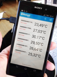 app på telefon som visar olika temperaturer