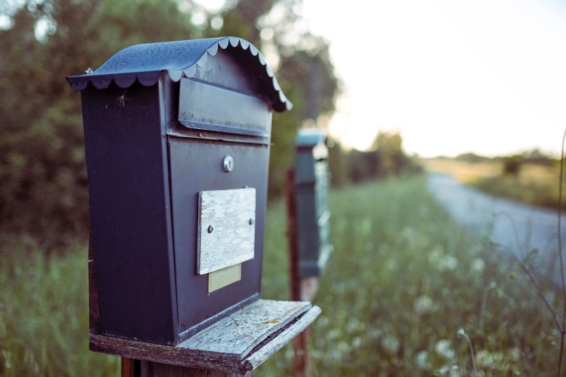 mailboxes along a country road. Photo. 