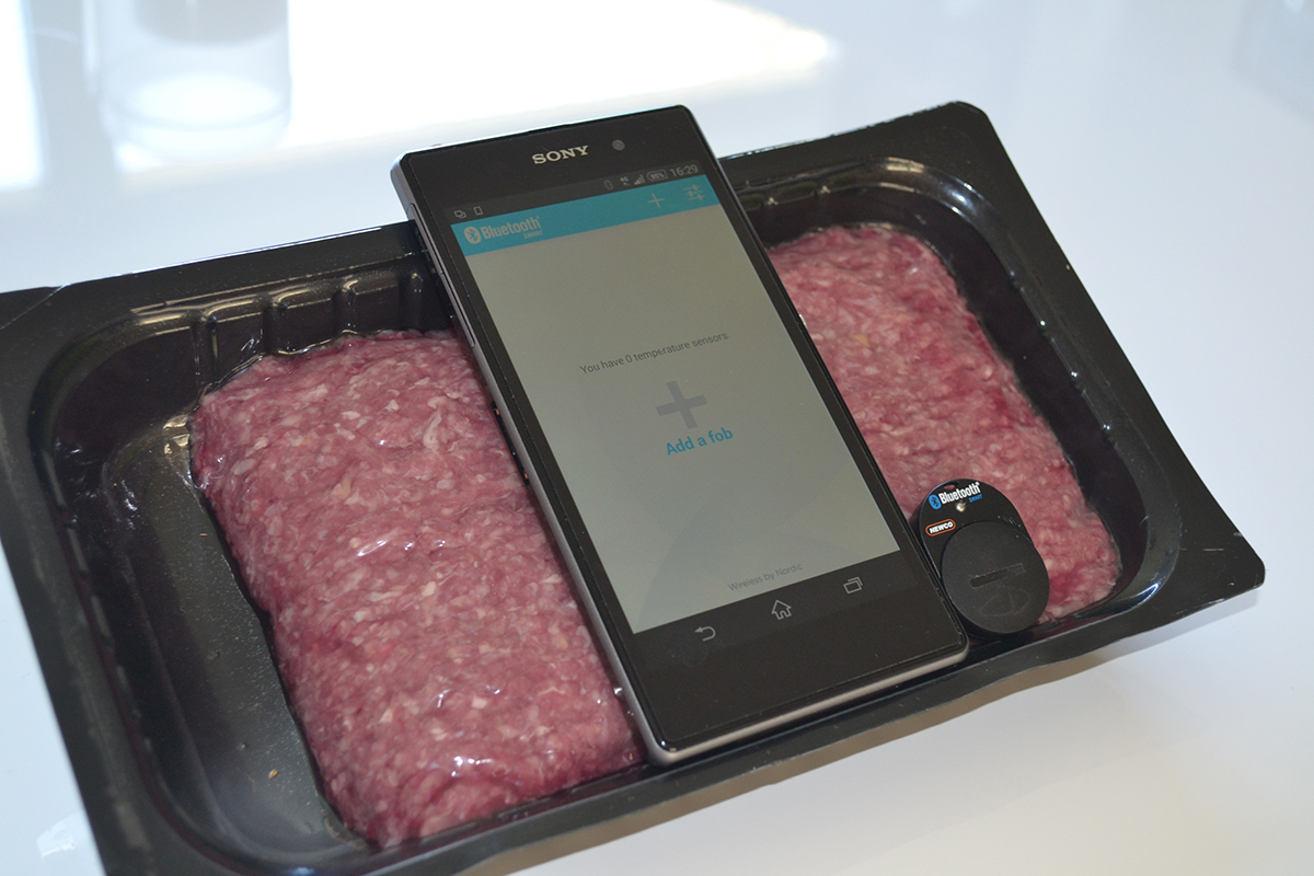 electronic device on a package of meat. photo. 