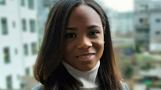 Portrait of Silvia Orejuela against a blurred background. Photo. 